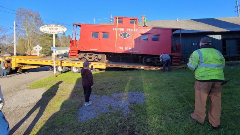 Historic Caboose Moved to New Home